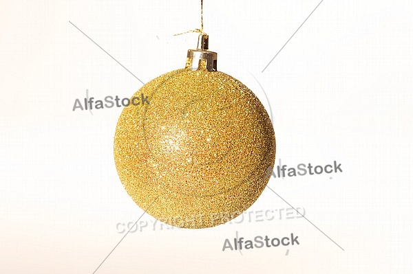 A bauble decorating a Christmas tree