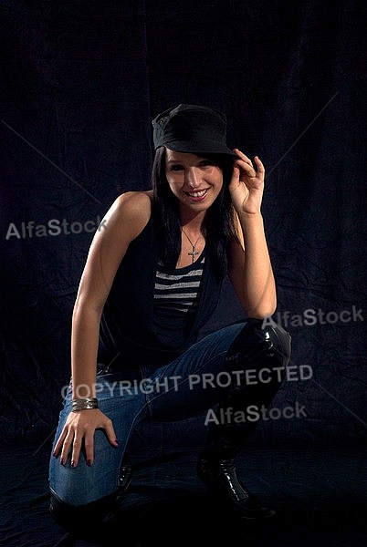 Girl shooting, black background