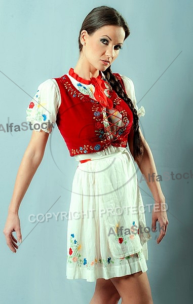 Girl with brown hair and national costume