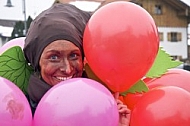 Hid Smile between Ballons , Holiday