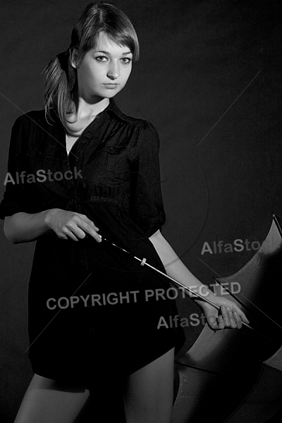 Modell girl posing with red umbrella