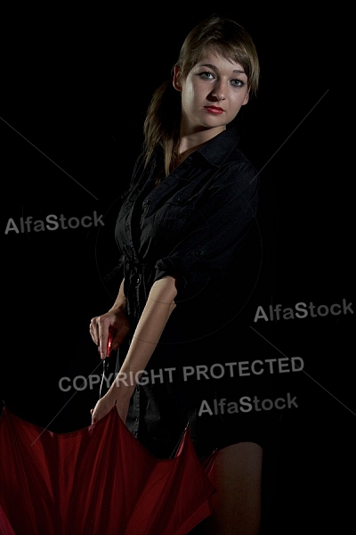 Modell girl posing with red umbrella