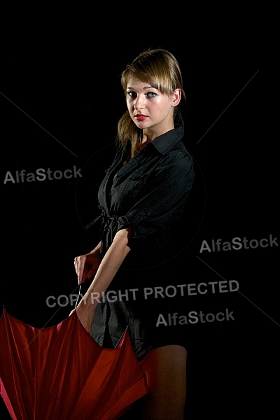 Modell girl posing with red umbrella