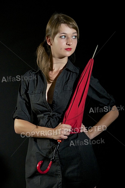 Modell girl posing with red umbrella