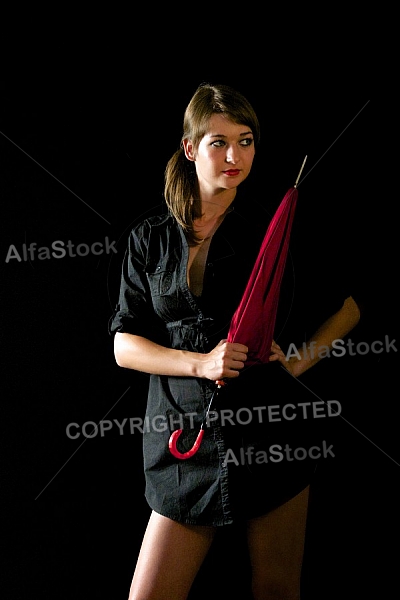 Modell girl posing with red umbrella