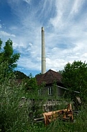 Old house with tower in the background