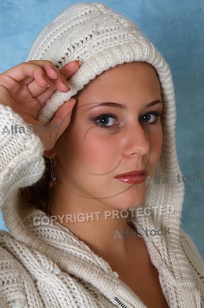 Portrait of a girl with brown hair and white sleeves