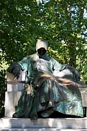 Statue of Anonymus in the castle court, Vajdahunyad Castle, Budapest, Hungary
