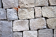 Stones with the reflection of a house