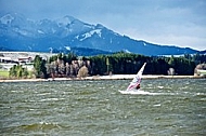 Surfer in the strom, Hopfensee, Bavaria, Germany