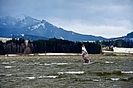 Surfer in the strom, Hopfensee, Bavaria, Germany