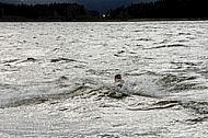 Surfer in the strom, Hopfensee, Bavaria, Germany