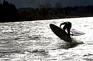 Surfer in the strom, Hopfensee, Bavaria, Germany