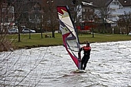 Surfer in the strom, Hopfensee, Bavaria, Germany