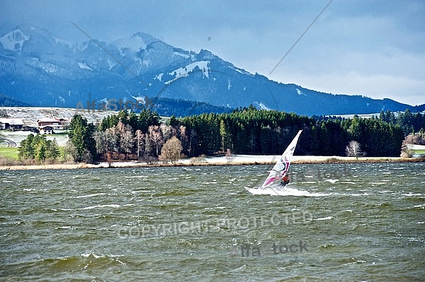 Surfer in the strom, Hopfensee, Bavaria, Germany