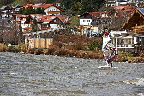 Surfer in the strom, Hopfensee, Bavaria, Germany