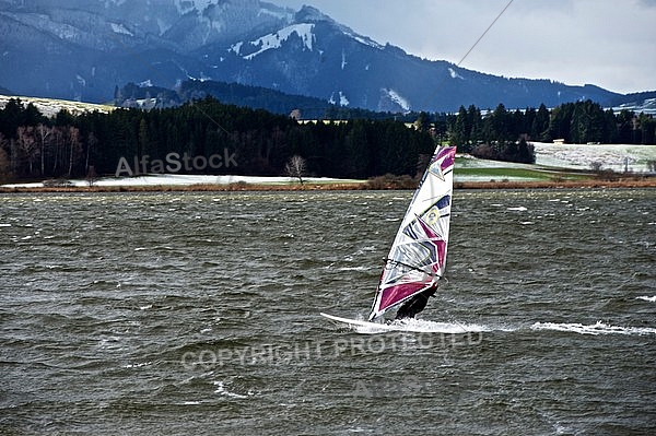 Surfer in the strom, Hopfensee, Bavaria, Germany