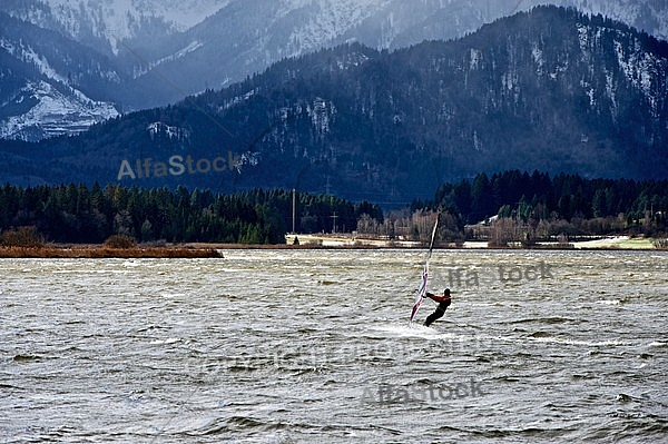 Surfer in the strom, Hopfensee, Bavaria, Germany