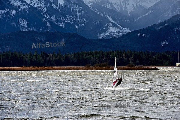 Surfer in the strom, Hopfensee, Bavaria, Germany