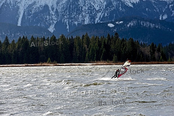 Surfer in the strom, Hopfensee, Bavaria, Germany