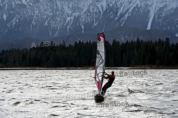 Surfer in the strom, Hopfensee, Bavaria, Germany