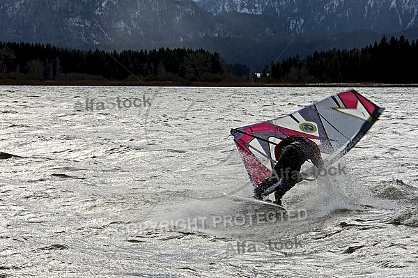 Surfer in the strom, Hopfensee, Bavaria, Germany