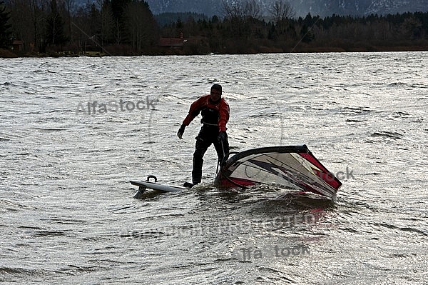 Surfer in the strom, Hopfensee, Bavaria, Germany