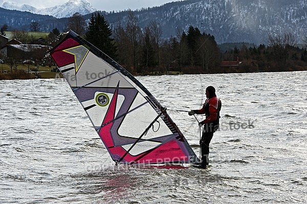 Surfer in the strom, Hopfensee, Bavaria, Germany