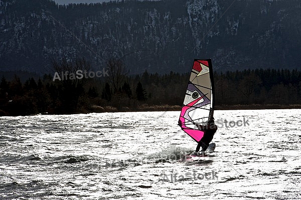 Surfer in the strom, Hopfensee, Bavaria, Germany