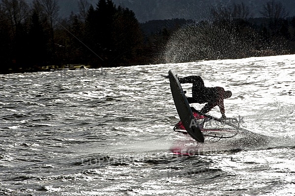 Surfer in the strom, Hopfensee, Bavaria, Germany