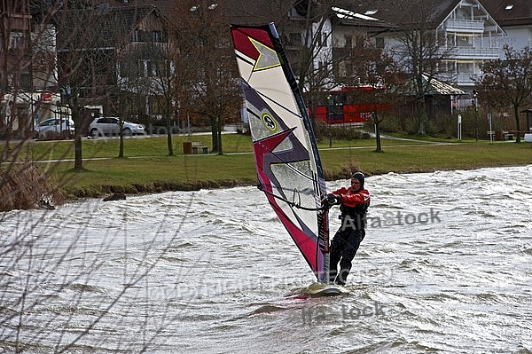 Surfer in the strom, Hopfensee, Bavaria, Germany