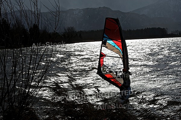 Surfer in the strom, Hopfensee, Bavaria, Germany