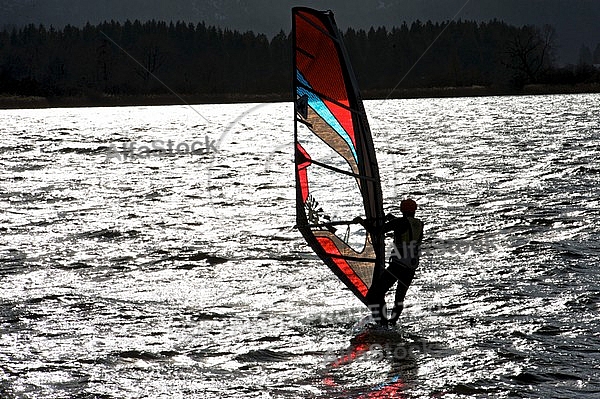 Surfer in the strom, Hopfensee, Bavaria, Germany