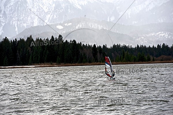 Surfer in the strom, Hopfensee, Bavaria, Germany