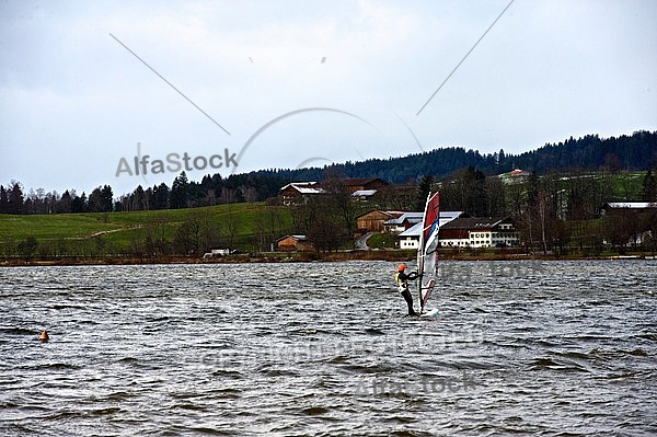 Surfer in the strom, Hopfensee, Bavaria, Germany