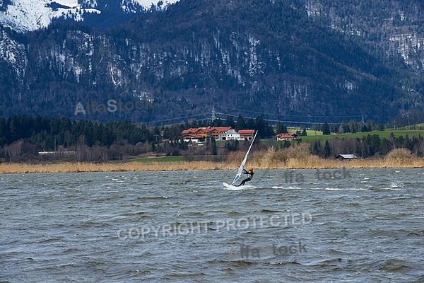 Surfer in the strom, Hopfensee, Bavaria, Germany