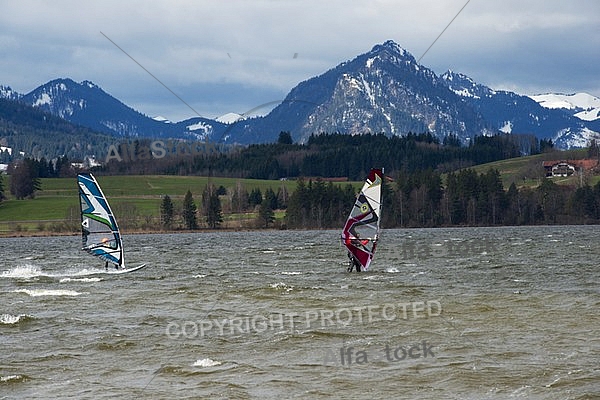 Surfer in the strom, Hopfensee, Bavaria, Germany