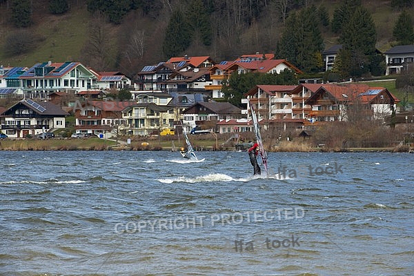 Surfer in the strom, Hopfensee, Bavaria, Germany