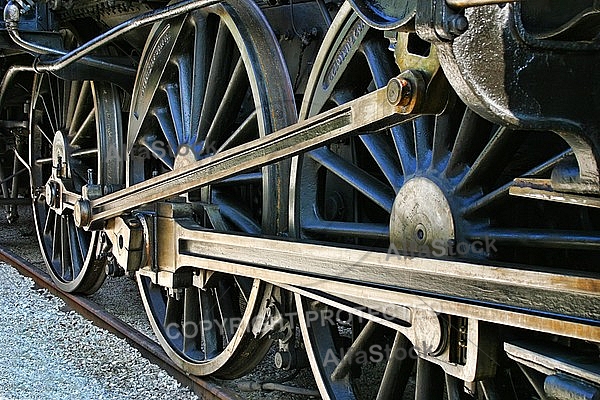 The old iron railway locomotive wheels.