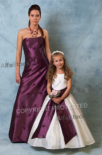 Woman and girl in purple and white Dresses