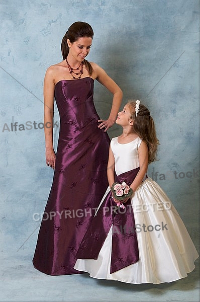 Woman and girl in purple and white Dresses