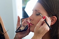 Young girl in a makeup studio