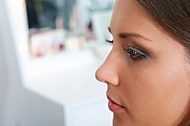 Young girl in a makeup studio