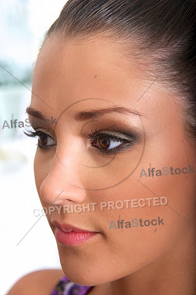 Young girl in a makeup studio