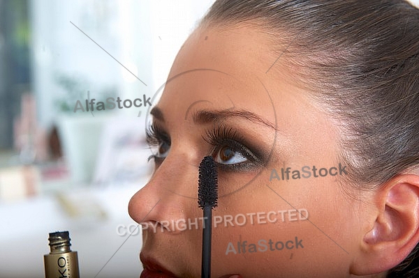 Young girl in a makeup studio