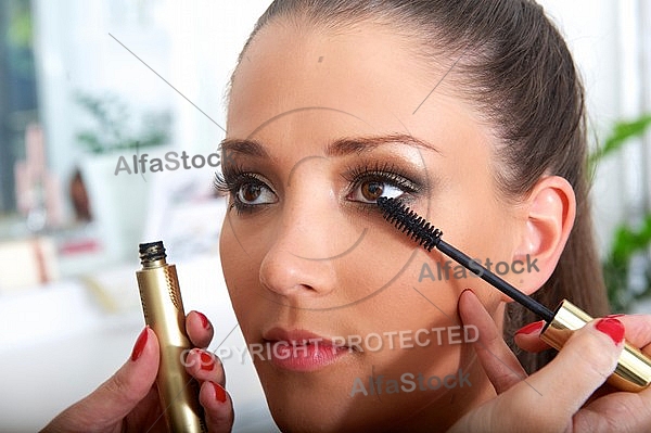 Young girl in a makeup studio