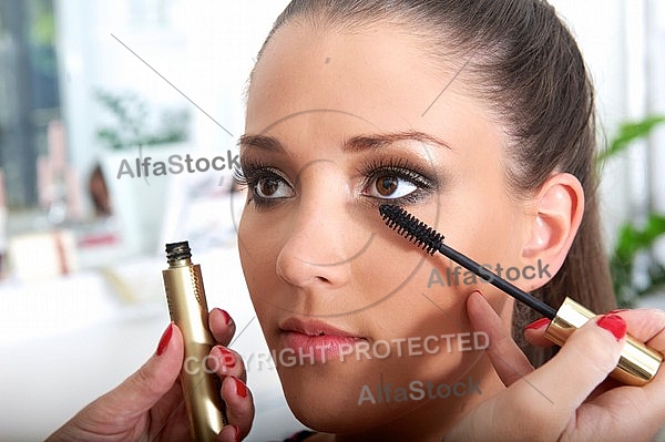 Young girl in a makeup studio