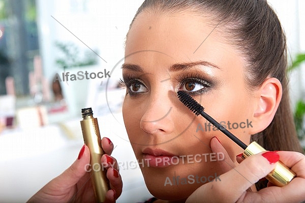 Young girl in a makeup studio