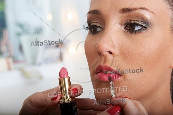 Young girl in a makeup studio