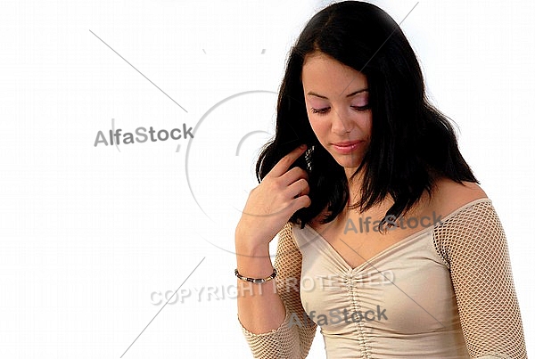 Young girl packs her bags for traveling. White background